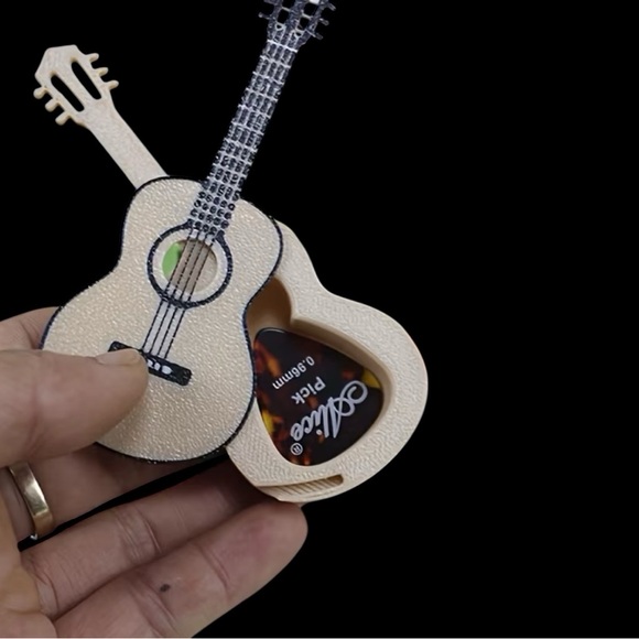 Other - New mini guitar with storage for guitar picks